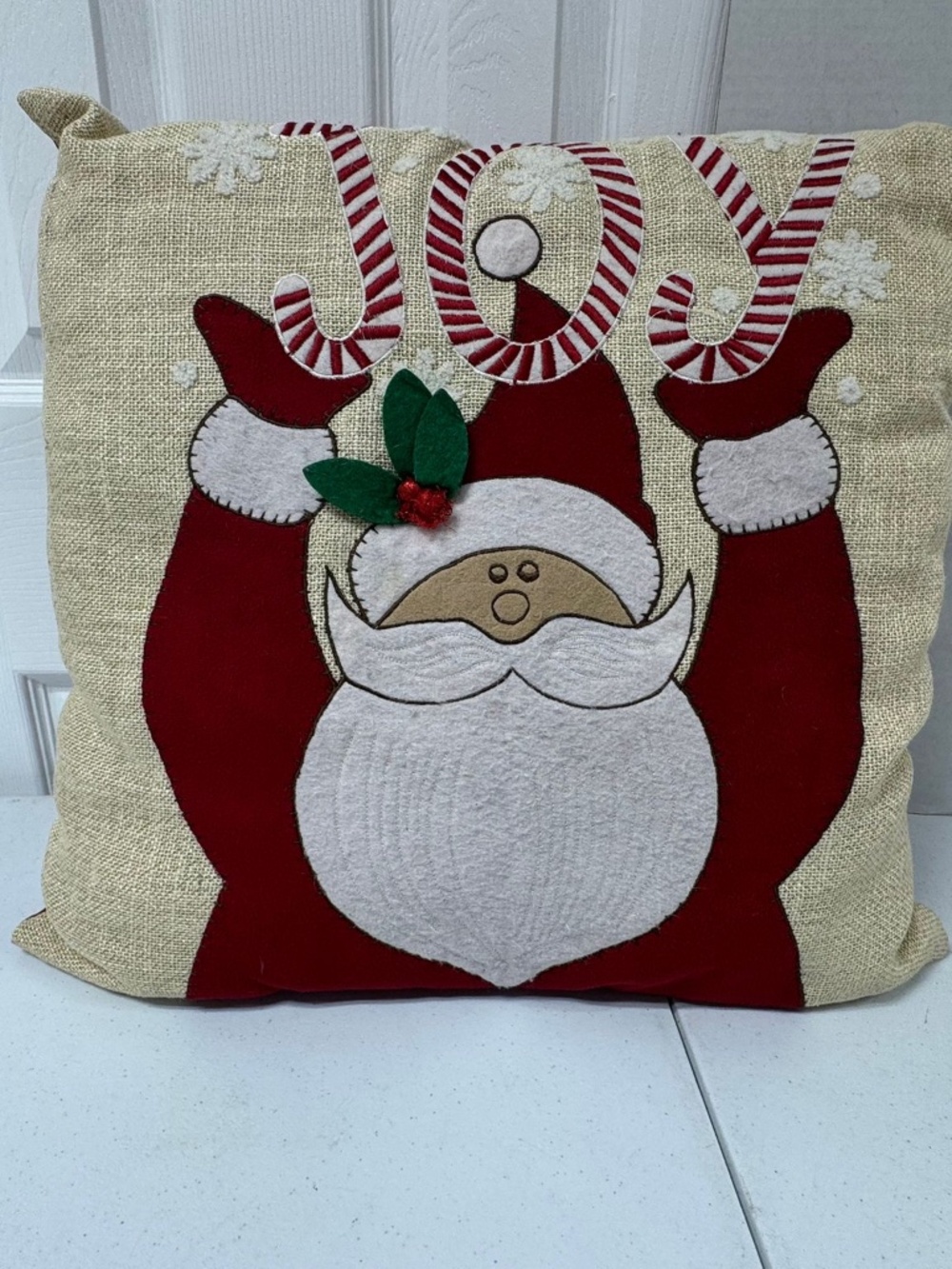 Decorative Santa-themed‎ Christmas Pillow.